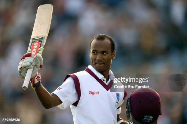 West Indies batsman Kraigg Brathwaite raises his bat as he leaves the field after being dismissed for 134 runs during day two of the 2nd Investec...