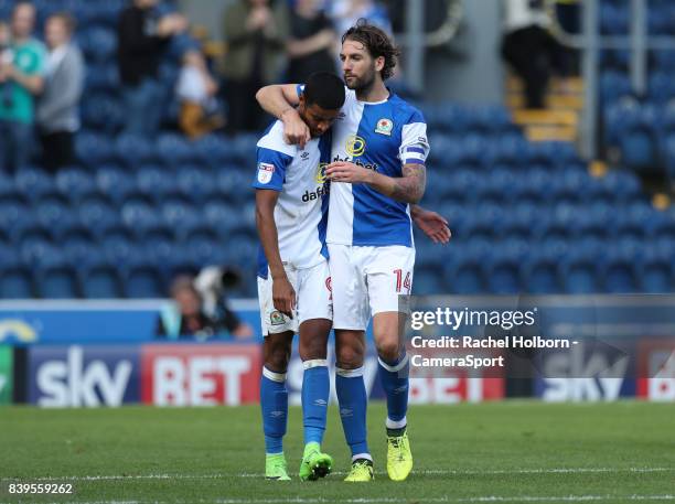 Blackburn Rovers Dominic Samuel and Charlie Mulgrew at the end of todays match during the Sky Bet League One match between Blackburn Rovers and...