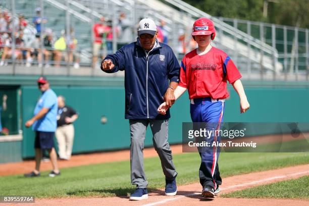Hall of Famer Reggie Jackson runs the bases with a member from the Riverside Little League Challenger Division during the 2017 Little League World...