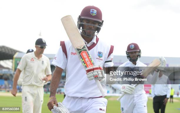 Kraigg Brathwaite of the West Indies leaves the field at tea after completing a century during the second day of the 2nd Investec Test match between...