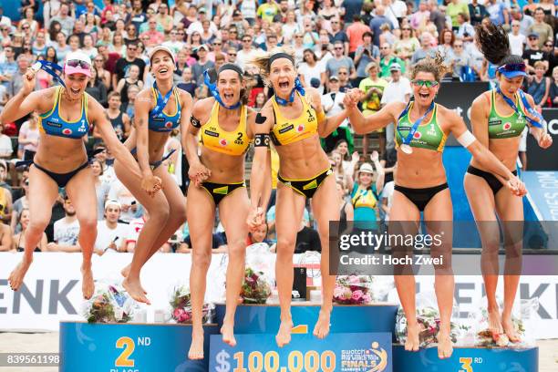 Silver medalist Agatha Bednarczuk Rippel and Eduarda Santos Lisboa of Brazil, gold medalist Kira Walkenhorst and Laura Ludwig of Germany, bronze...