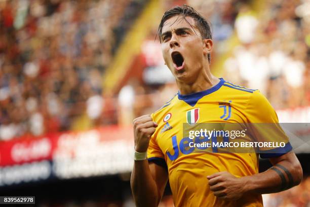 Juventus' Argentinian forward Paulo Dybala celebrates after scoring during the Italian Serie A football match Genoa v Juventus at The Luigi Ferraris...