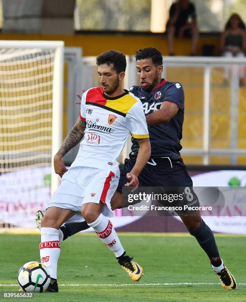 Player of Benevento Calcio Danilo Cataldi vies with Bologna FC player Saphir Taider during the Serie A match between Benevento Calcio and Bologna FC...