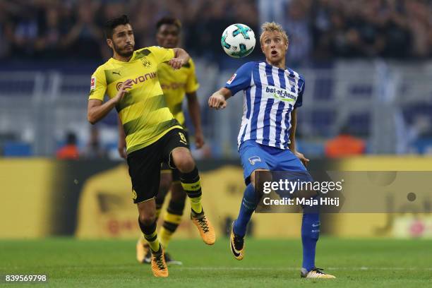 Nuri Sahin of Dortmund and Per Ciljan Skjelbred of Berlin during the Bundesliga match between Borussia Dortmund and Hertha BSC at Signal Iduna Park...