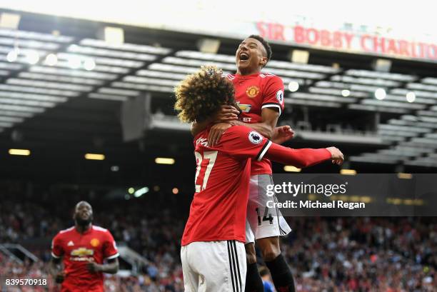 Marouane Fellaini of Manchester United celebrates scoring his sides second goal with Jesse Lingard of Manchester United during the Premier League...