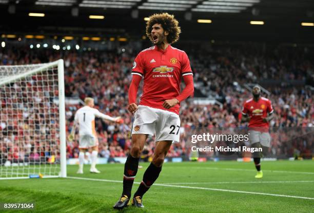 Marouane Fellaini of Manchester United celebrates scoring his sides second goal during the Premier League match between Manchester United and...