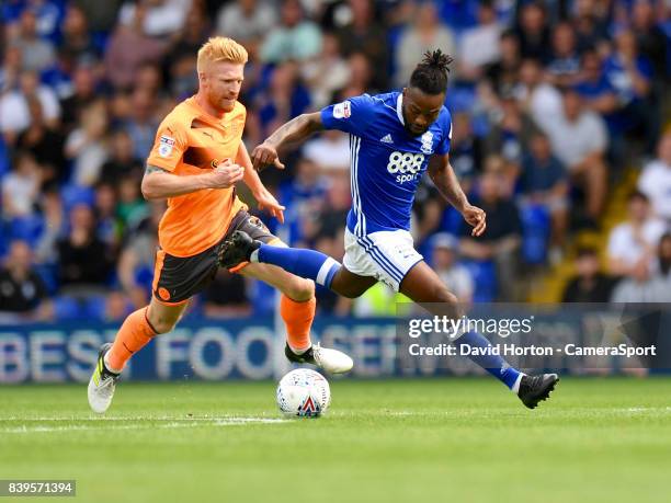 Reading's Paul McShane battles with Birmingham City's Jacques Maghoma during the Sky Bet Championship match between Birmingham City and Reading at St...