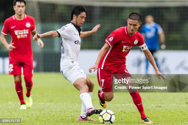 Wai Wong of Wofoo Tai Po fights for the ball with Kwok Wai Leung of Dreams FC during the Dreams FC vs Wofoo Tai Po match of the week one Premier...