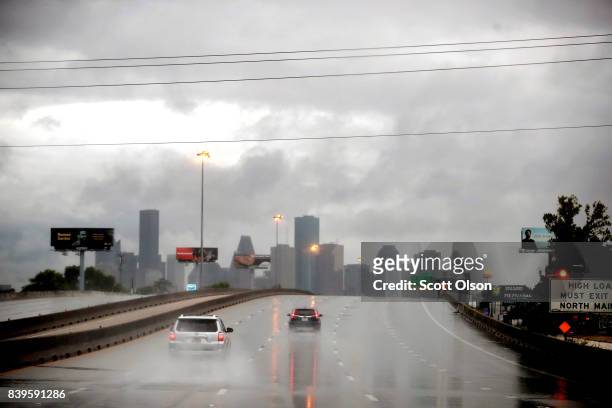 Rain from Hurricane Harvey batters the downtown area on August 26, 2017 in Houston, Texas. Harvey, which made landfall north of Corpus Christi late...