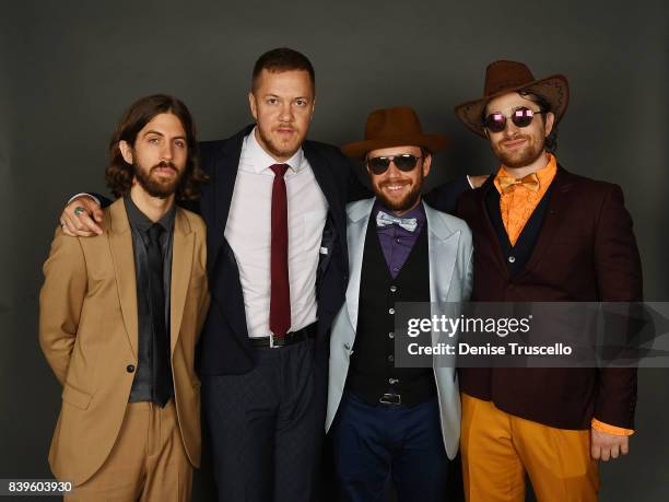 Guitarist Wayne Sermon, singer Dan Reynolds, bassist Ben McKee and drummer Daniel Platzman of Imagine Dragons arrive at the Tyler Robinson...