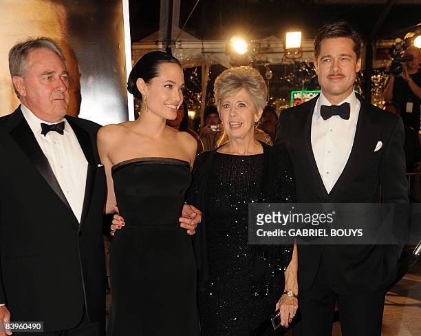 Actors Angelina Jolie and Brad Pitt arrive with Brad Pitt's parents, Bill and Jane Pitt for the Los Angeles premiere of �The Curious Case of Benjamin...
