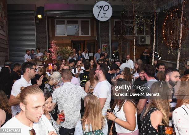 Crowds party in front of Kopparbergs Recycling Rig at Number 90 in Hackney Wick, which encouraged dancers to trade in their empties to power the...