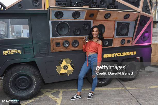 Party-goers trade in their empties to power the music on Kopparbergs Recycling Rig at Number 90 in Hackney Wick on August 26, 2017 in London,...