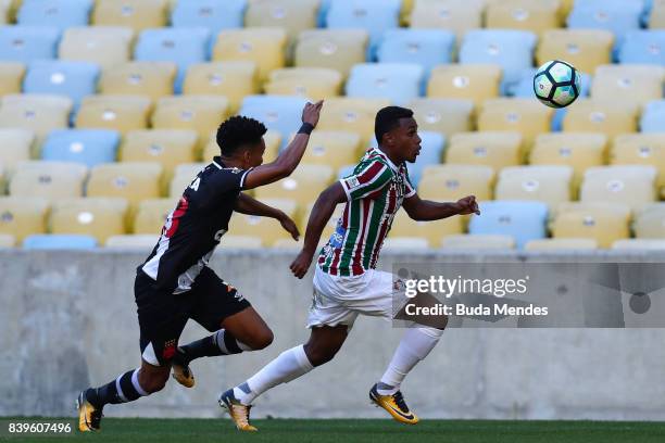 Wendel of Fluminense struggles for the ball with Madson of Vasco da Gama during a match between Fluminense and Vasco da Gama as part of Brasileirao...