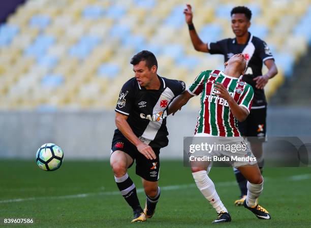 Wellington Silva of Fluminense struggles for the ball with Wagner of Vasco da Gama during a match between Fluminense and Vasco da Gama as part of...