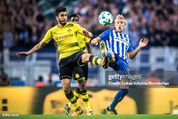 Nuri Sahin of Dortmund and Per Skjelbred of Berlin in action during the Bundesliga match between Borussia Dortmund and Hertha BSC at Signal Iduna...