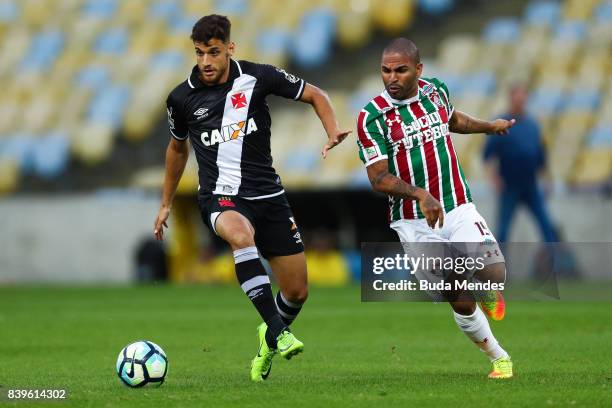 Romarinho of Fluminense struggles for the ball with Guilherme Costa of Vasco da Gama during a match between Fluminense and Vasco da Gama as part of...