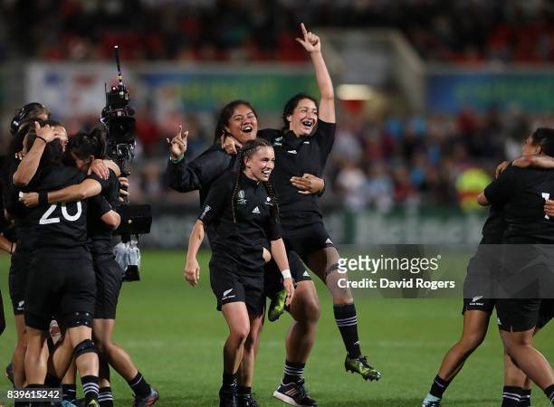 New Zealand players celebrate after winning the Women's Rugby World Cup 2017 Final between England and New Zealand on August 26, 2017 in Belfast,...