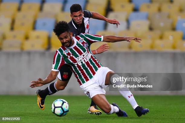 Matheus Alessandro of Fluminense struggles for the ball with Madson of Vasco da Gama during a match between Fluminense and Vasco da Gama as part of...