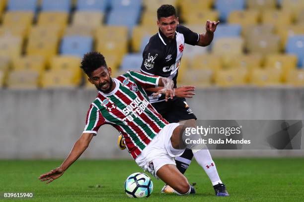 Matheus Alessandro of Fluminense struggles for the ball with Madson of Vasco da Gama during a match between Fluminense and Vasco da Gama as part of...