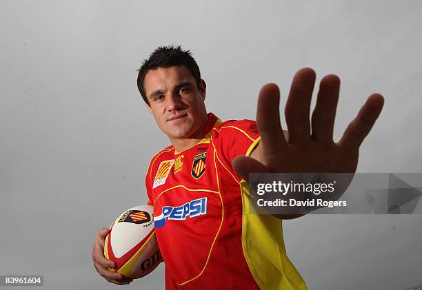 Dan Carter, the New Zealand All Black standoff, wears his new Perpignan shirt during a photoshoot at Canet December 9, 2008 in Perpignan, France.