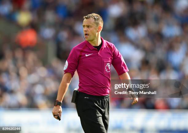 Referee Stuart Atwell during the Premier League match between Huddersfield Town and Southampton at John Smith's Stadium on August 26, 2017 in...