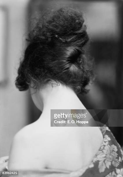 The neck of actress Pepita Bobadilla , 1919. Bobadilla was married to playwright Haddon Chambers and British spy Sidney Reilly.
