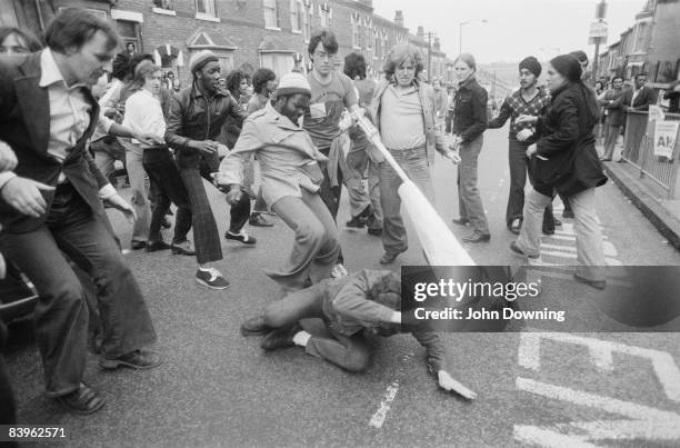 Clash between supporters of the the far right fascist party, the National Front, and their opponents, Birmingham, 16th August 1977.