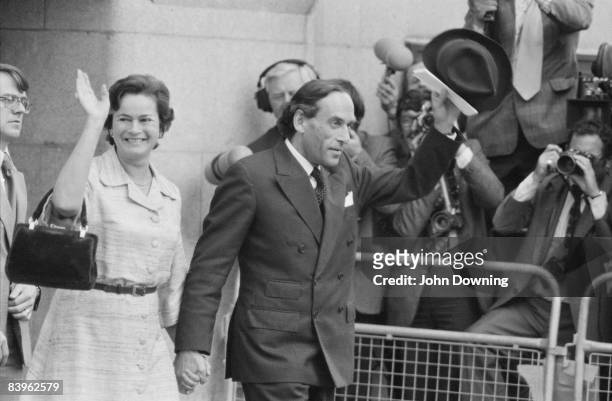 British Liberal politician Jeremy Thorpe and his wife Marion leave the Old Bailey in London, 10th June 1979. Thorpe is charged with attempted murder...