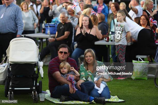 Family look on during Cartmel Races at Cartmel Racecourse on August 26, 2017 in Cartmel, Cumbria.