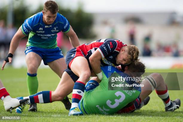 Ian Madigan of Bristol fights for the ball with Finlay Bealham of Connacht during the Pre-Season Friendly match between Connacht Rugby and Bristol...