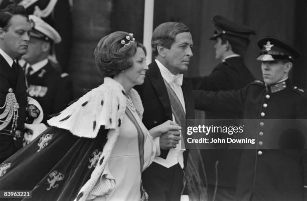 Queen Beatrix of the Netherlands with her husband, Claus von Amsberg on the day of her investiture, Amsterdam, 30th April 1980.