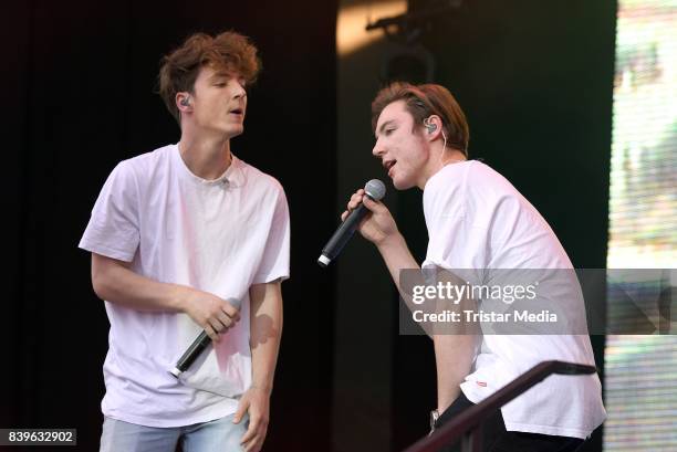 Roman Lochmann and Heiko Lochmann of Die Lochis perform during the 'Stars for Free' open air festival by 104.6 RTL radio station at Kindl-Buehne...