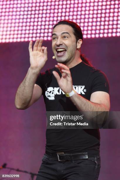 Buelent Ceylan performs during the 'Stars for Free' open air festival by 104.6 RTL radio station at Kindl-Buehne Wuhlheide on August 26, 2017 in...