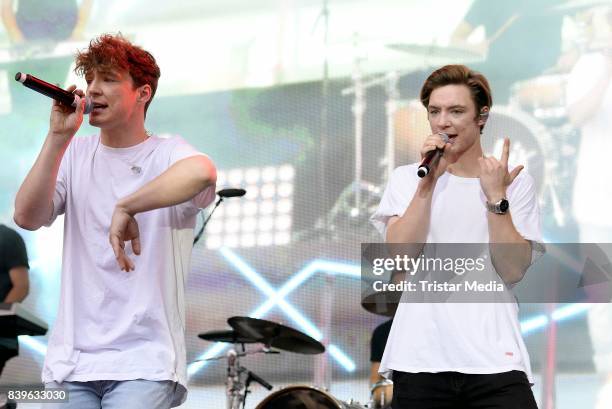 Roman Lochmann and Heiko Lochmann of Die Lochis perform during the 'Stars for Free' open air festival by 104.6 RTL radio station at Kindl-Buehne...