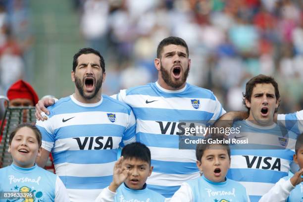 Juan Manuel Leguizamon , Matias Alemanno and Nicolas Sanchez sing the National Anthem prior to the round two match between Argentina and South Africa...