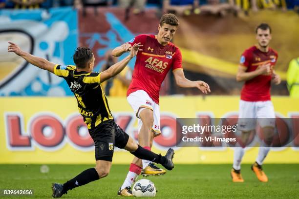 Charlie Colkett of Vitesse, Guus Til of AZ during the Dutch Eredivisie match between Vitesse Arnhem and AZ Alkmaar at Gelredome on August 26, 2017 in...