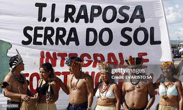 Brazilian natives from several tribes stand a protest in front of the Supreme Court in Brasilia on December 9, 2008. The country's supreme court will...