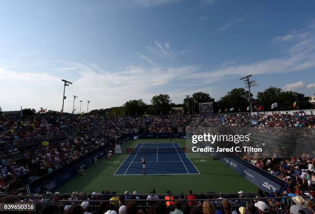 Roberto Bautista Agut of Spain serves to Damir Dzumhur during the men's singles championship final of the Winston-Salem Open at Wake Forest...