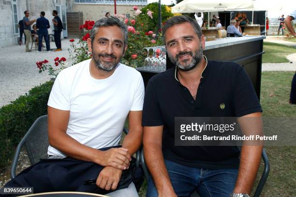 Directors of the movie "Le sens de la fete", Eric Toledano and Olivier Nakache attend the 10th Angouleme French-Speaking Film Festival : Day Five on...
