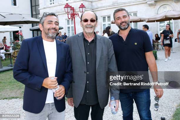 Team of the movie "Le sens de la fete", Co-director Eric Toledano, actor Jean-Pierre Bacri and co-director Olivier Nakache attend the 10th Angouleme...