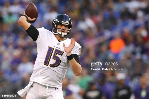 Quarterback Ryan Mallett of the Baltimore Ravens passes against the Buffalo Bills in the first half during a preseason game at M&T Bank Stadium on...