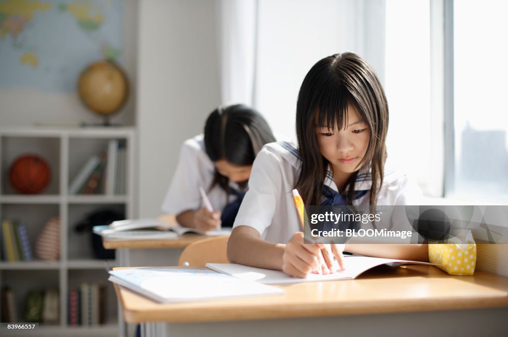Girl Students Taking Lessons High-Res Stock Photo - Getty Images