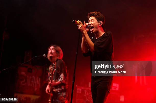Ryota Kohama and Takahiro Moriuchi of One OK Rock perform at Reading Festival at Richfield Avenue on August 26, 2017 in Reading, England.