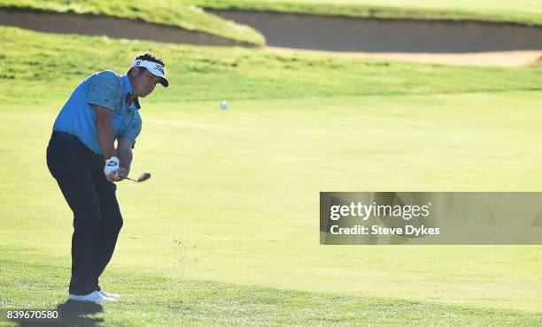 Eric Axley hits his chip shot on the14th hole during round three of the WinCo Foods Portland Open at Pumpkin Ridge Golf Club - Witch Hollow on August...