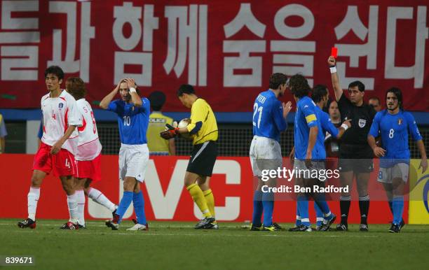 Referee Byron Moreno of Ecuador shows the red card to Francesco Totti of Italy during the FIFA World Cup Finals 2002 Second Round match between South...