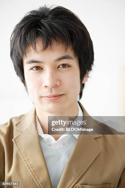 portrait of man, close up - portrait close up loosely stock pictures, royalty-free photos & images