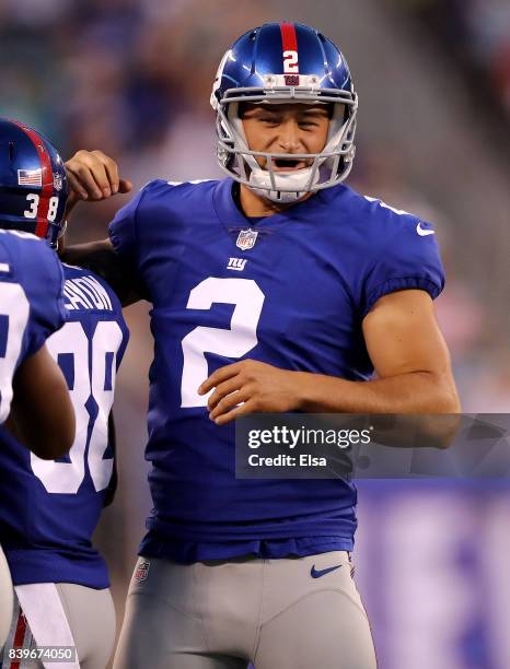 Mike Nugent of the New York Giants celebrates in the first half against the New York Jets during a preseason game on August 26, 2017 at MetLife...