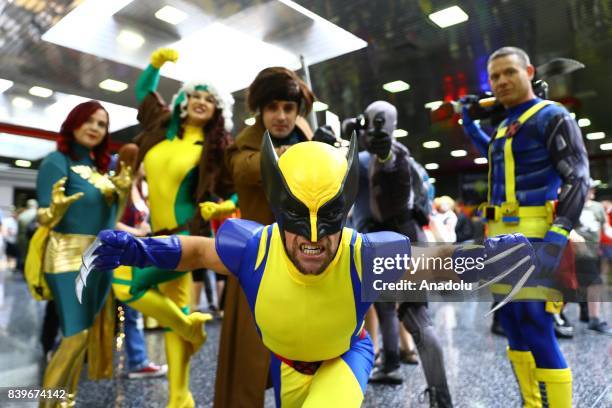 People attend Wizard World Comic Con Fair with their costumes at Donald E. Stephens Congress Center in Chicago, United States on August 26, 2017.