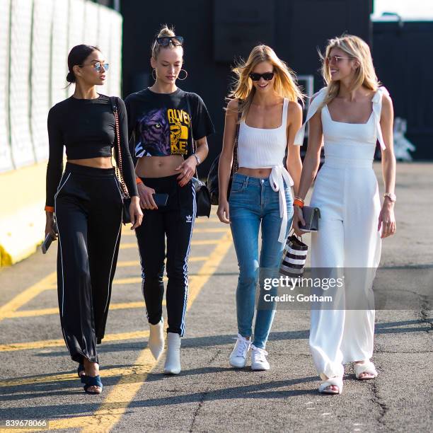 Models Shanina Shaik, Hannah Ferguson, Nadine Leopold and Devon Windsor are seen in Chelsea on August 26, 2017 in New York City.